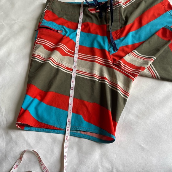 Patagonia Vibrant Red and Teal Board Shorts for Men - Picture 8 of 9